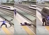 Kίνα: Αστυνομικός σώζει γυναίκα που επιχειρεί να πέσει πάνω στο τρένο (vid)
