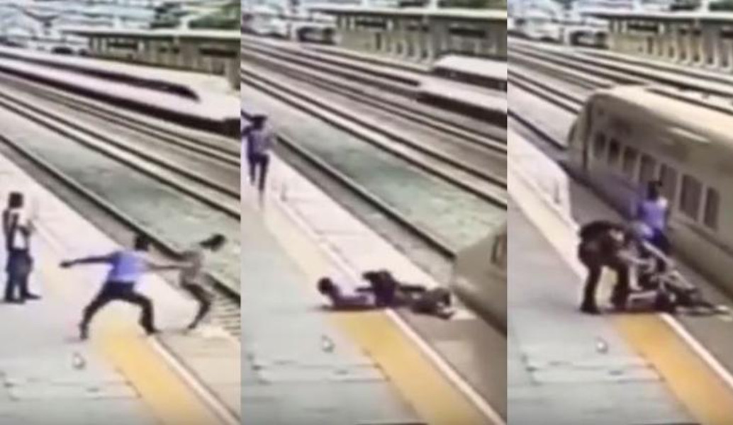 Kίνα: Αστυνομικός σώζει γυναίκα που επιχειρεί να πέσει πάνω στο τρένο (vid)
