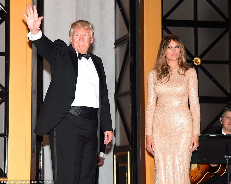 The president elect wore a traditional black tuxedo. His wife's Reem Acra gown was custom made for the occasion 