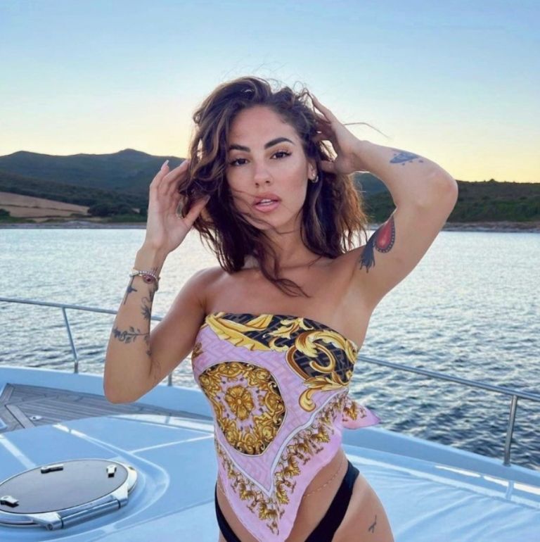 Italian influencer Giulia De Lellis on a beach in Mykonos