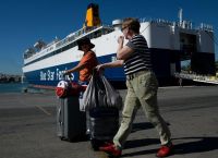 Summer Exodus: Athenian Holidaymakers Flock to Greek Islands via Major Ports