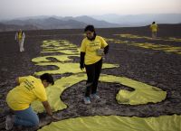 Athens Beachgoers Shocked and Saddened by Greenpeace Sand Sculpture