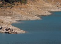 Athens Faces Water Crisis as Lake Mornos Levels Drop, Uncovering Sunken Village