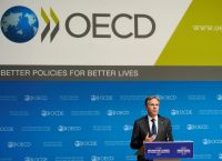 ΟΟΣΑ: Σβήνουν οι Ελπίδες για Ισχυρή Παγκόσμια Ανάπτυξη το 2026