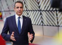 Greece ramps military support for Cyprus while PM signals possible economic measures,rules out early polls.