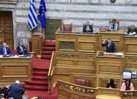 Clash Over Rule of Law in Greece: Scandals, Surveillance and Institutional Trust at the Center